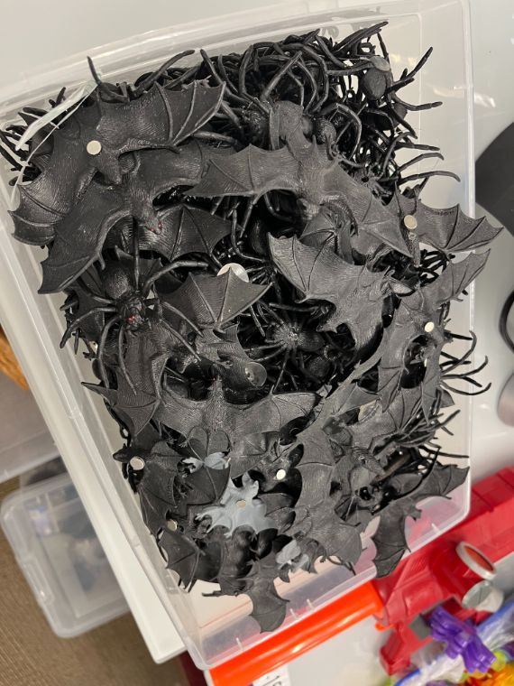 Bin of magnetic plastic bats and spiders