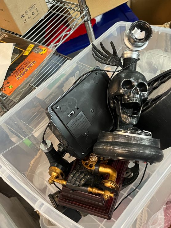 Bin of Halloween-themed phones