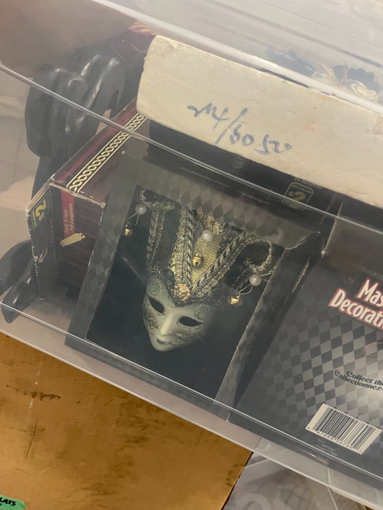 Bin of mini masks, misc.