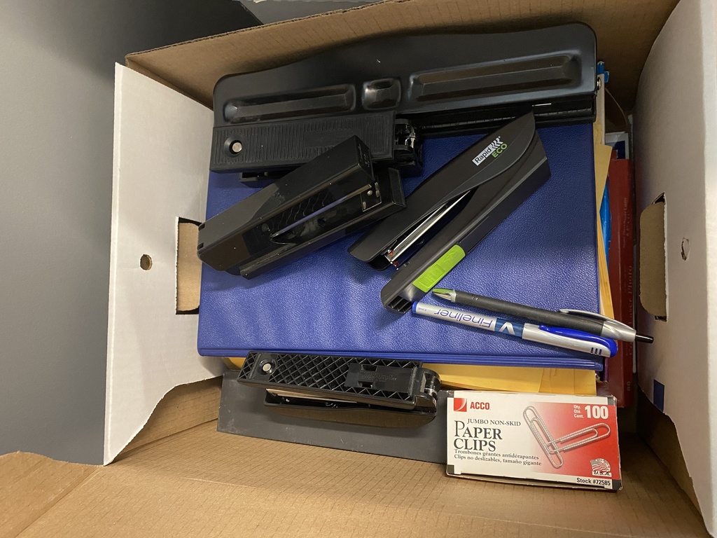 Box of Staplers, Hole Punch, and others
