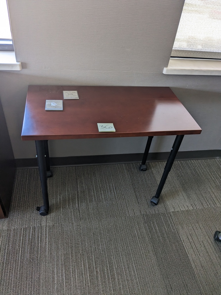 small table on casters (3'x1.5'x2.5')