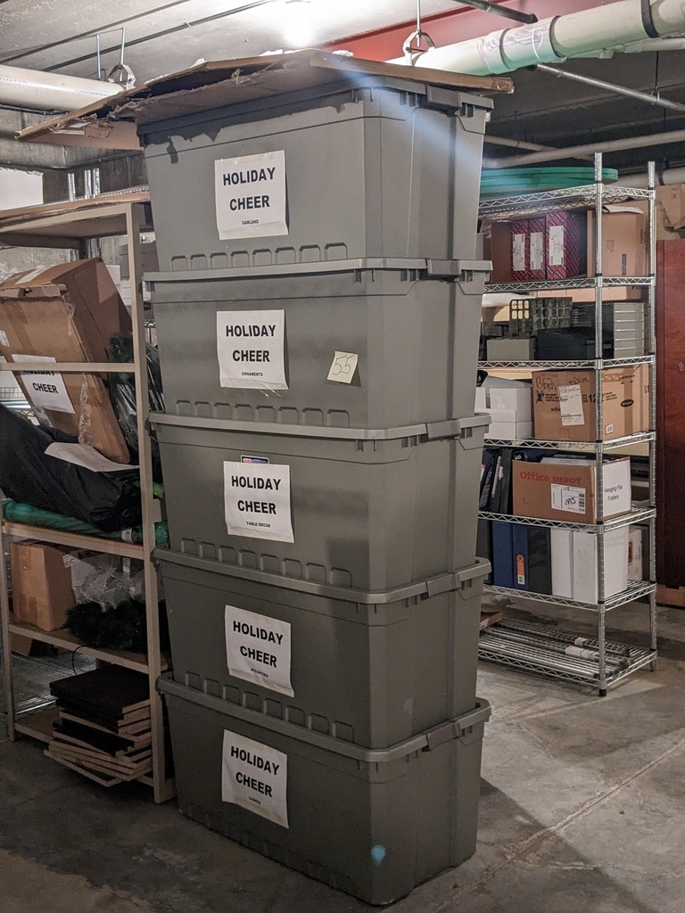 totes full of Christmas decorations