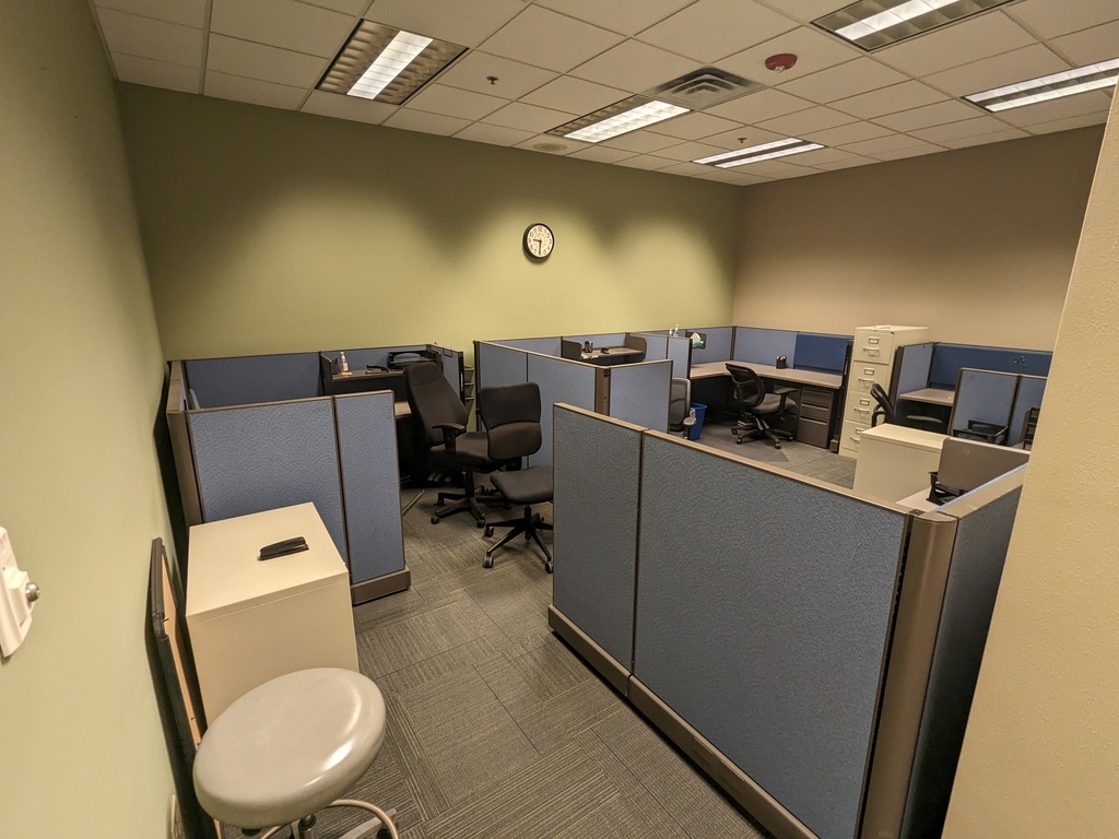 workstations - fabric panel L-shape worksurfaces, 2 hanging shelves, tackboard, 42"H panels