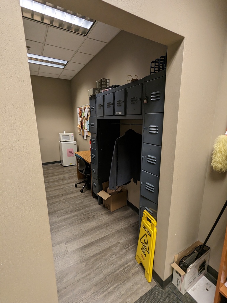 metal cube lockers with coat pole in middle
