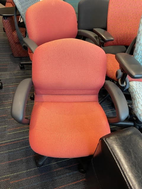 ORANGE UPHOLSTERED CHAIR
