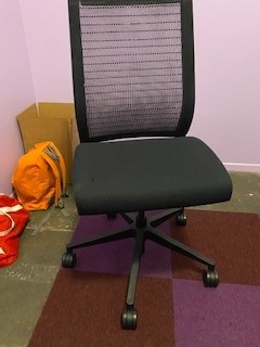 Black armless task chair