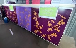 Credenza with metal 
gray/purple doors.