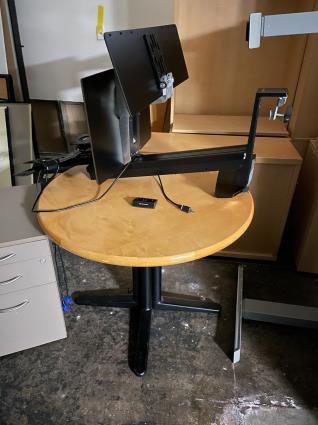 Round table with monitor stand
