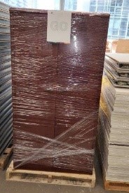 Skids of wood cabinets