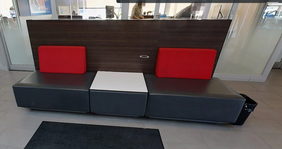 Side Table (between red/grey chairs)