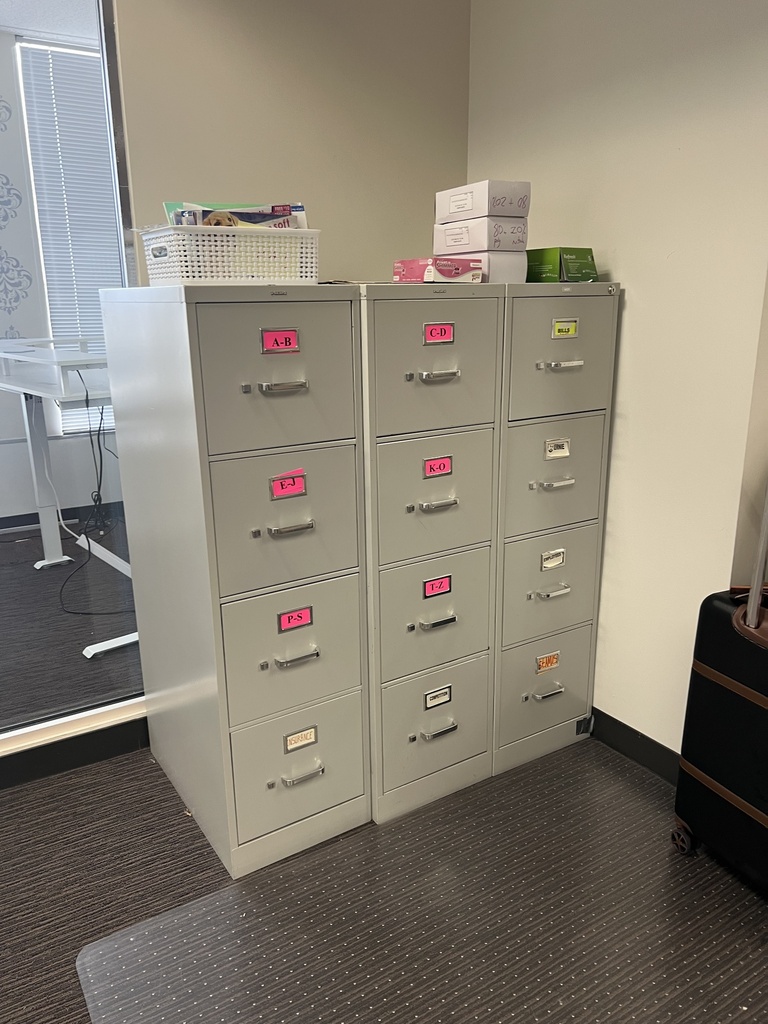 Four drawer vertical filing cabinet