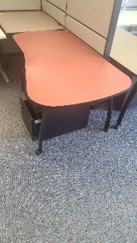 Kidney-Shaped Table on Wheels