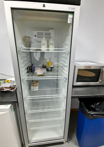 Tall glass fronted fridge