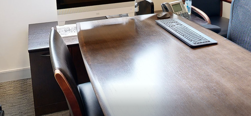 Credenza (dark wood behind table)