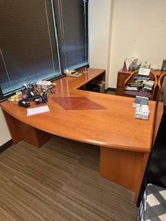 Wood L-shape desk with design and wall-mounted overhead