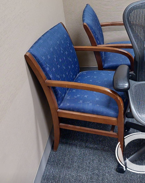 Blue patterned guest chair with arms
