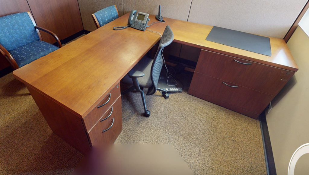 L-shaped desk surfaces