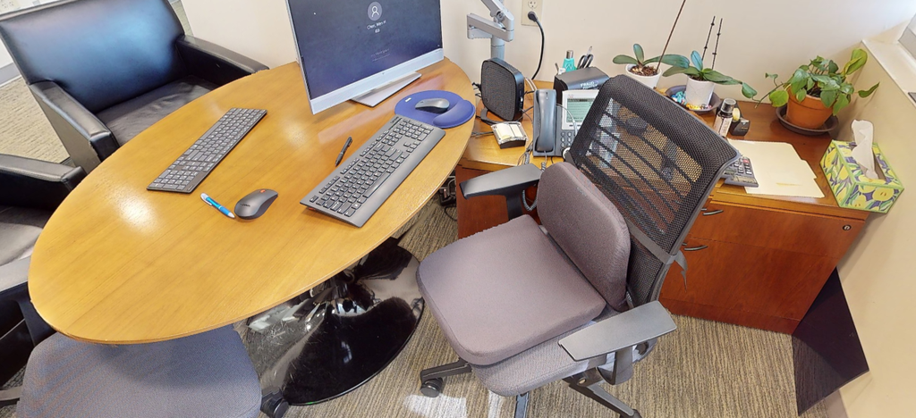 L-shaped desk with table