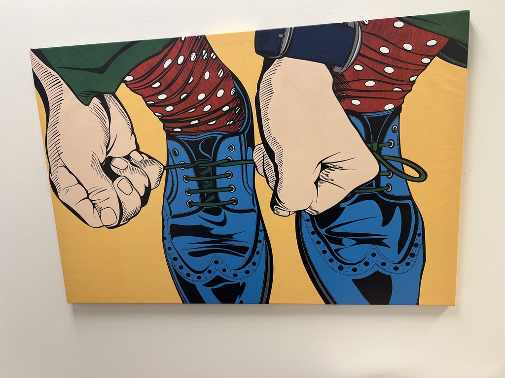 Blue Shoes being tied