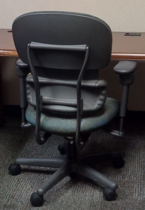 task chair at lobby L desk