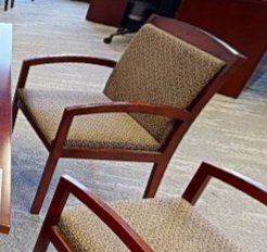 Brown guest chair with arms