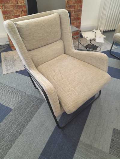Grey fabric armchair