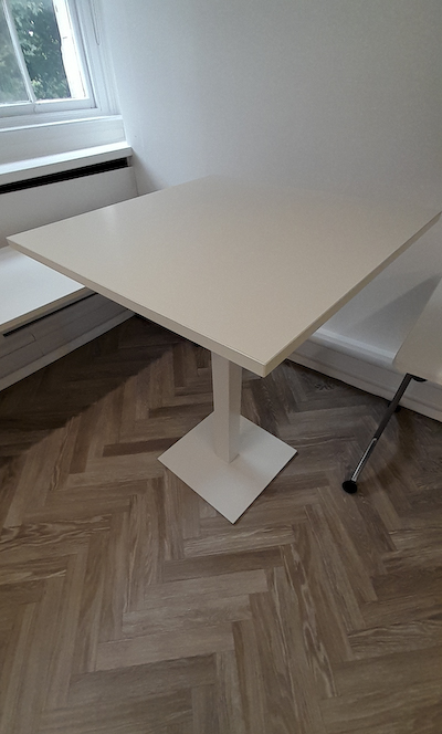 Tall white square metal pedestal table