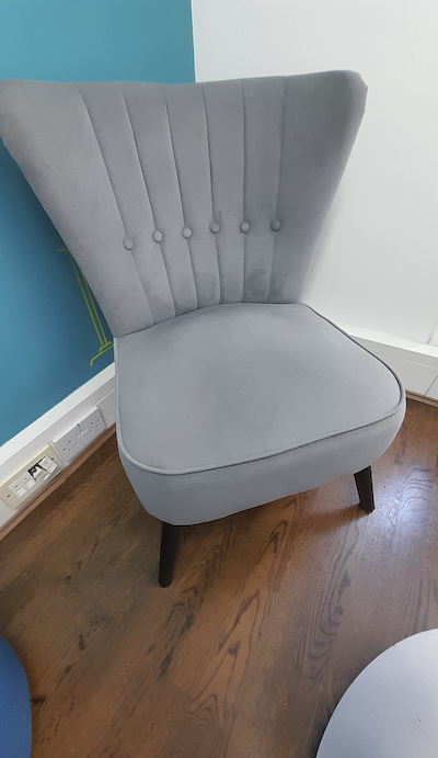 Grey velvet button back sofa chair