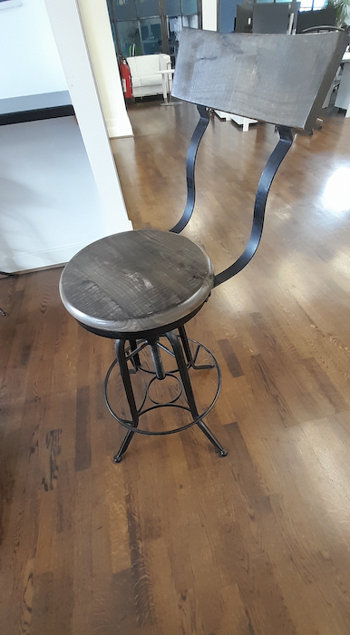 Tall black metal antique-effect stool