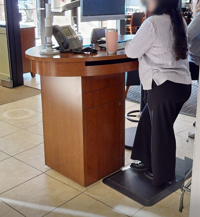 1 ped standing front desk