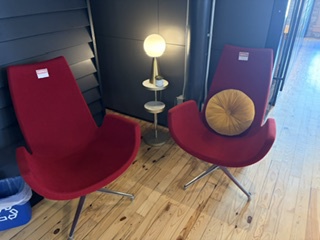 Red lounge chairs by entrance 