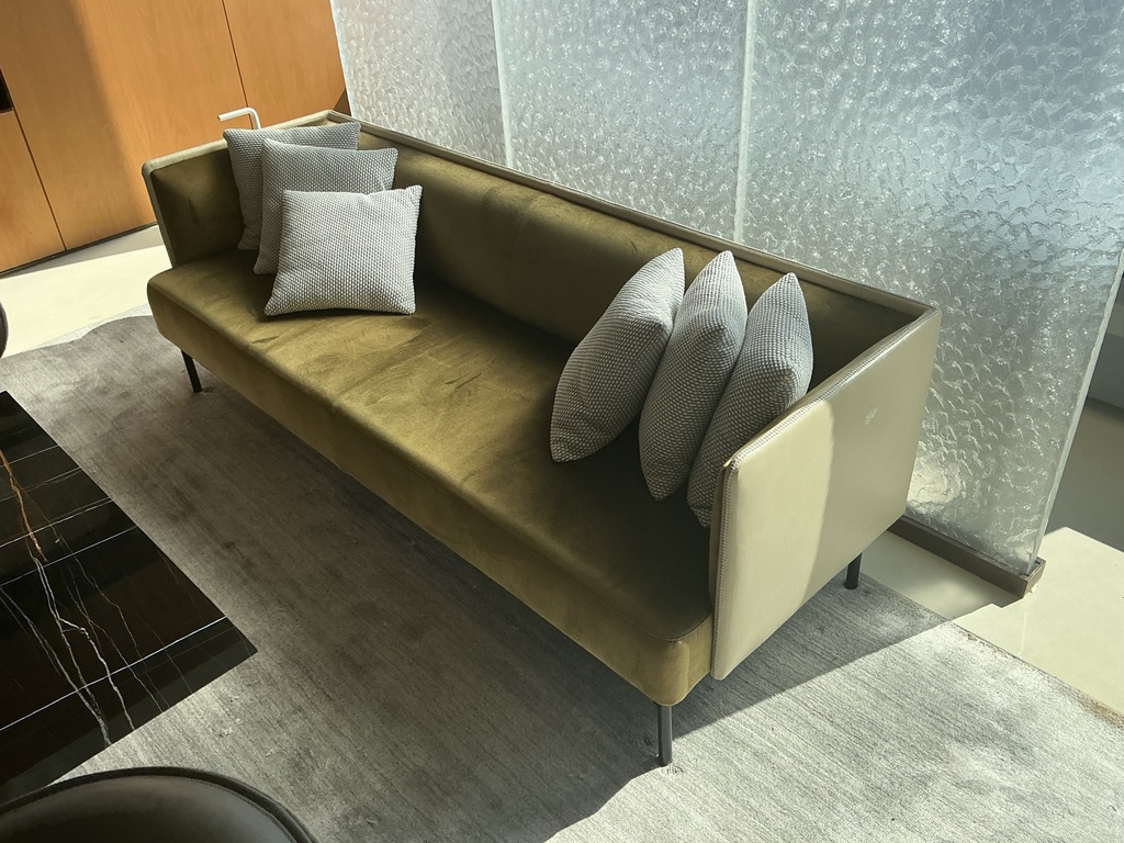Sofa — leather/fabric— green with six throw pillows