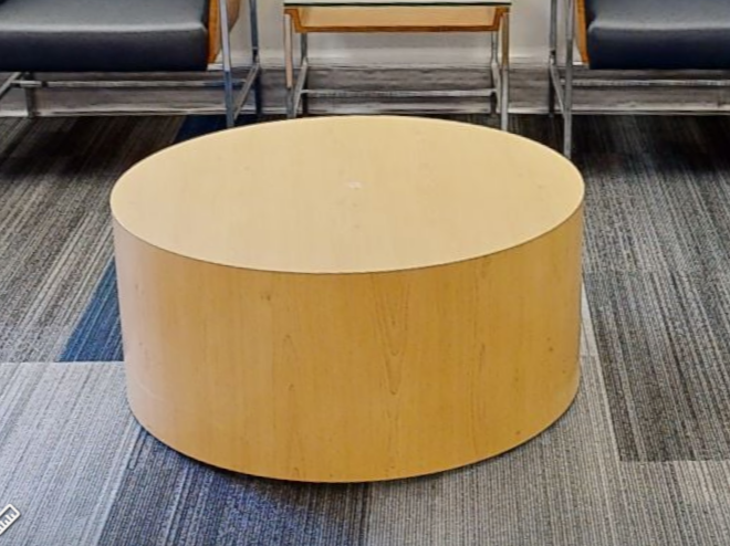 Round solid coffee table