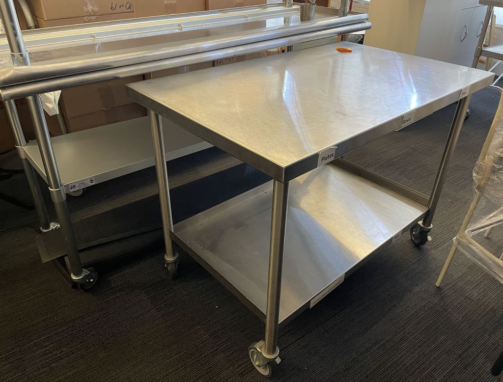 Metal table on casters
