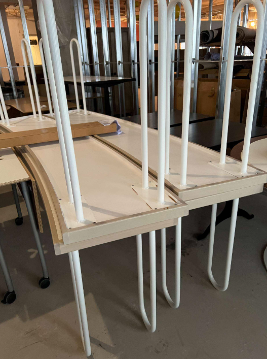 Long curve table with gray top and white legs