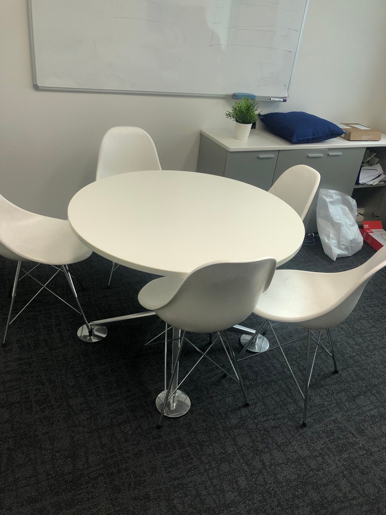 White roundtable including chairs