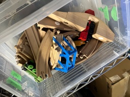 [#I2-35] Bin of toy trains and tracks, misc.