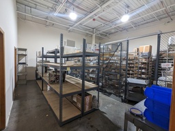 [#D14-136] grey metal racking with partical board shelves, 4-high
