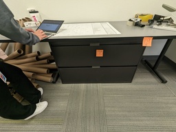 [#C19-162] rectangular laminate table by printer area (8'x2'x2.5')