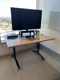 [#E2-24] Small Desk - tan top, black base, missing 2 wheels (right side)