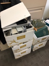 [#F1-7] boxes with binders and filing tabs