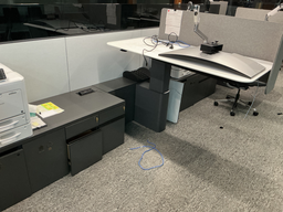 [#E10-35] Cantilever style sit stand desk with lower storage, 66" × 31" top and 24" × 60" lower storage with two BF, one garbage and one shredder box