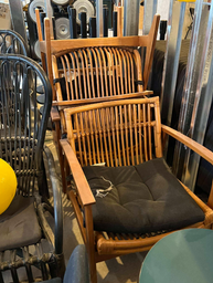 [#B9-26] Brown wood chair with black cushions